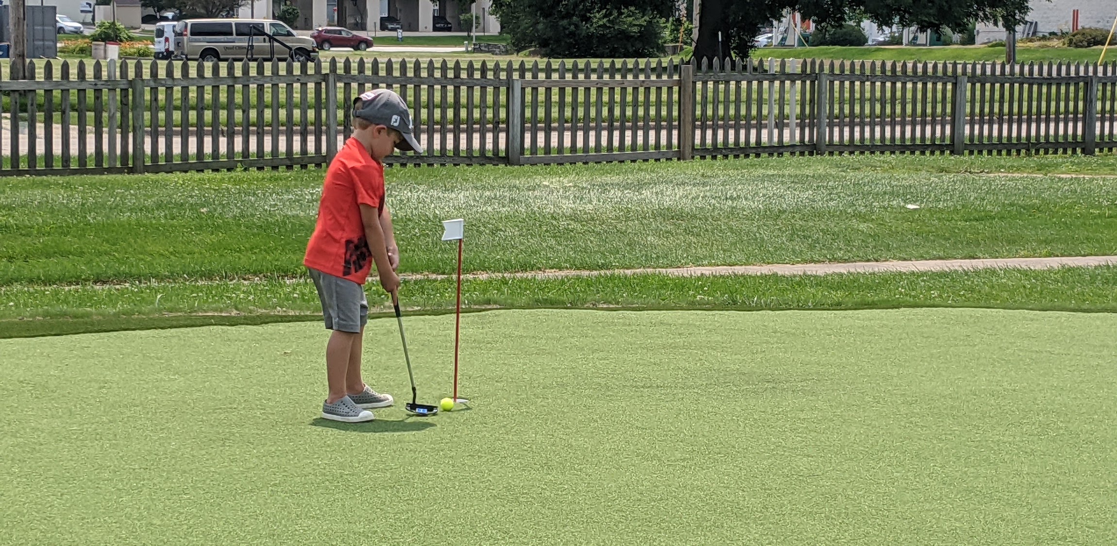 little boy putting