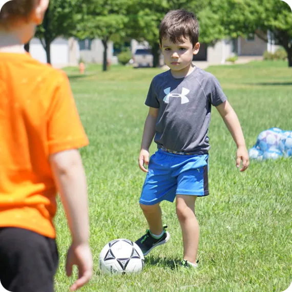 young boys playing soccer