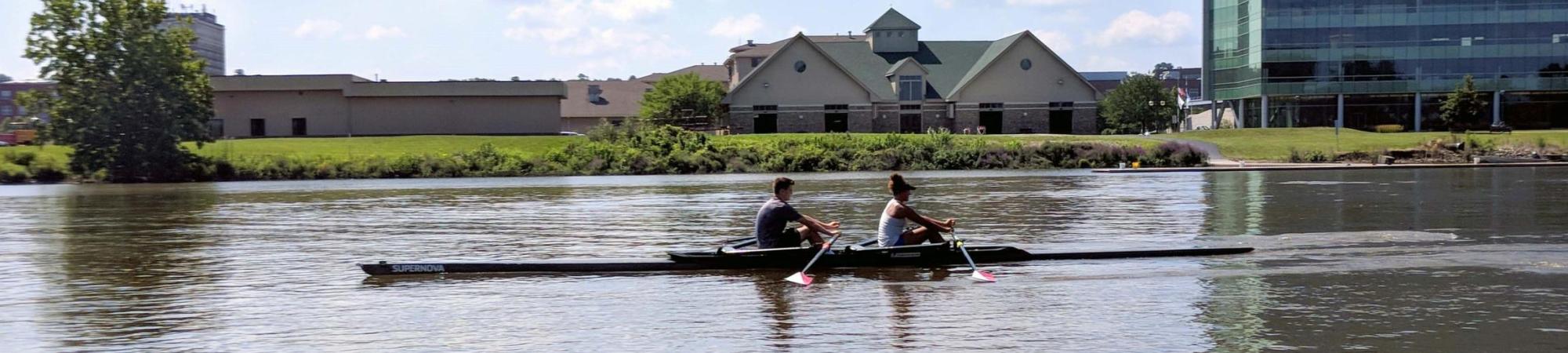 Two Rowers from YMCA Quad Cities Rowing on the Slough.